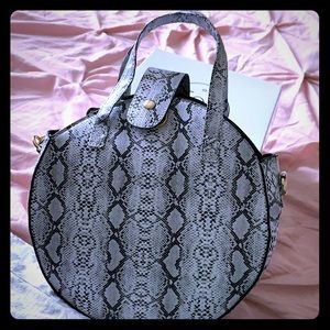 Round Crossbody snake print bag (SOLD)